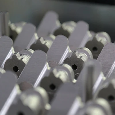 **Layer by layer:** is how multiple bore­scope bosses “grow” on a substrate. After they have been removed from the base, then it’s time to machine them to near net shape.