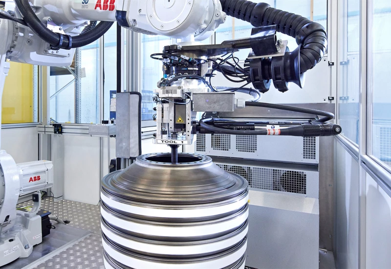 How robots help screw together compressor rotors